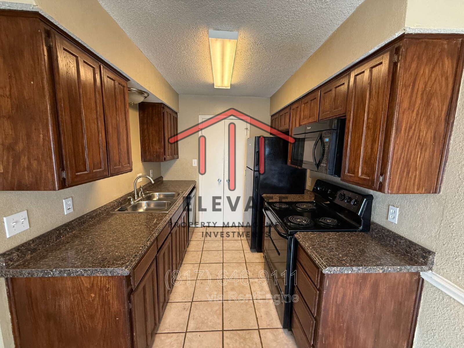 Cozy Charm Awaits: 2-Bed Townhouse with Fireplace on Holiday Ln, North Richland Hills! property image